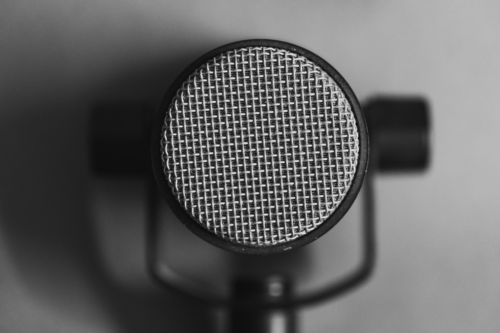A close-up of a studio microphone